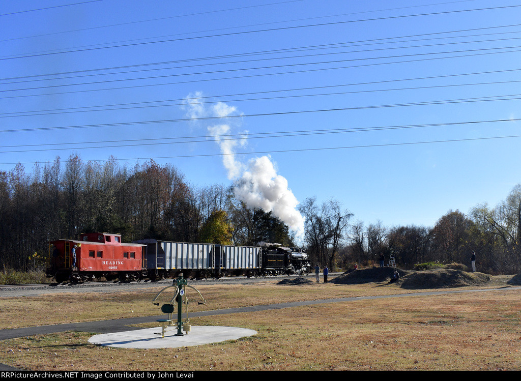 Reading caboose trailing on the steam freight photo charter-location is the edge of the lot right off of Bailey St